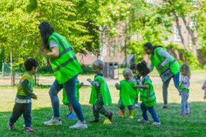 Happy children participating in outdoor preschool activities at FinlandWay® Schools