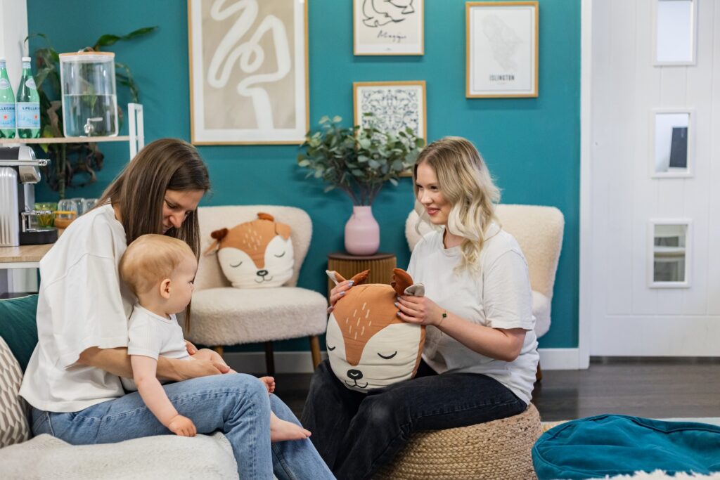 Teacher discussing with a mother 