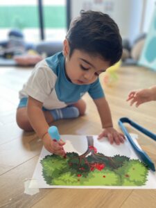 Children participating in preschool curriculum activities