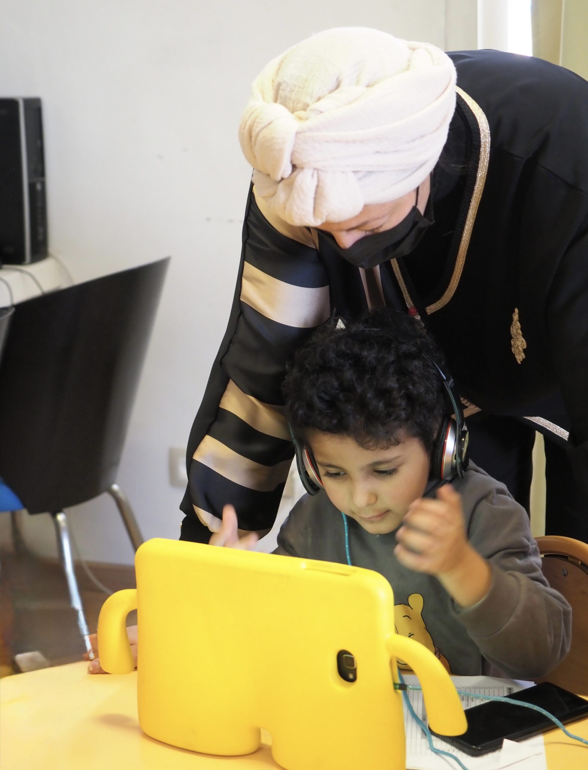 Preschool children engaging with technology as part of modern curriculum