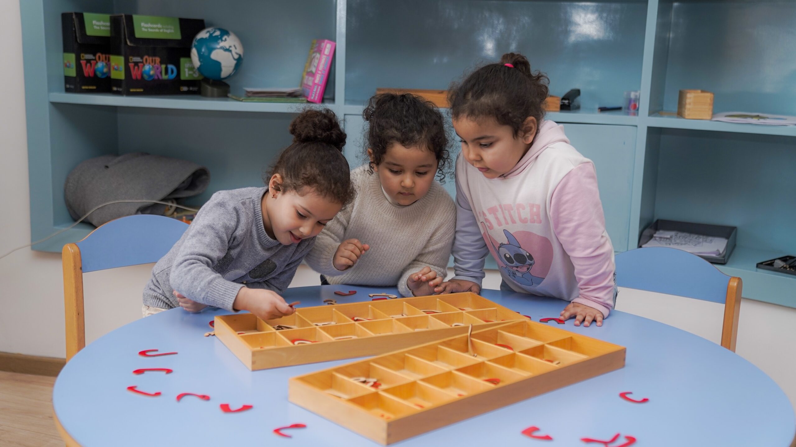 Child demonstrating play-based learning outcomes through self-directed exploration